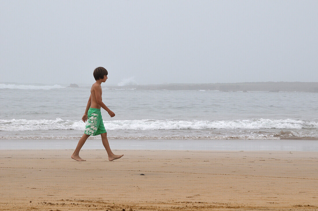 Boy Walking on Beach,Rabat,Morocco