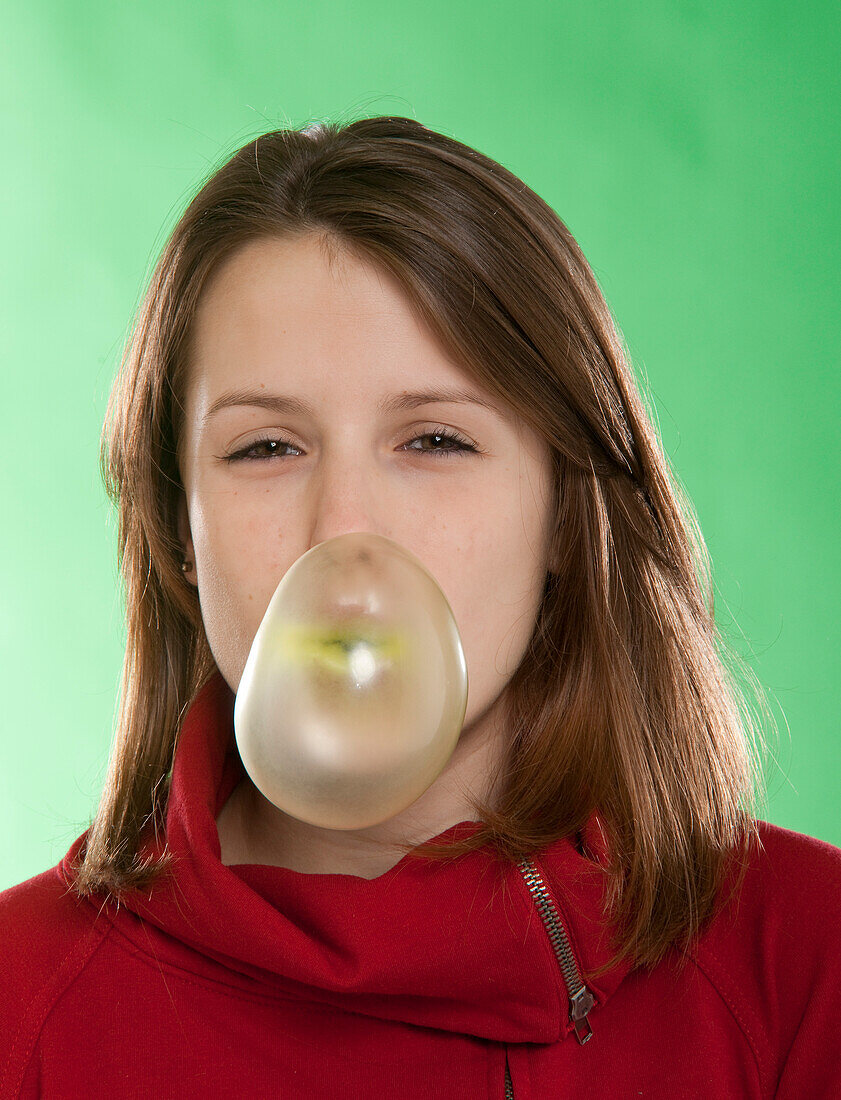 Teenage Girl Blowing Bubble with Bubble Gum