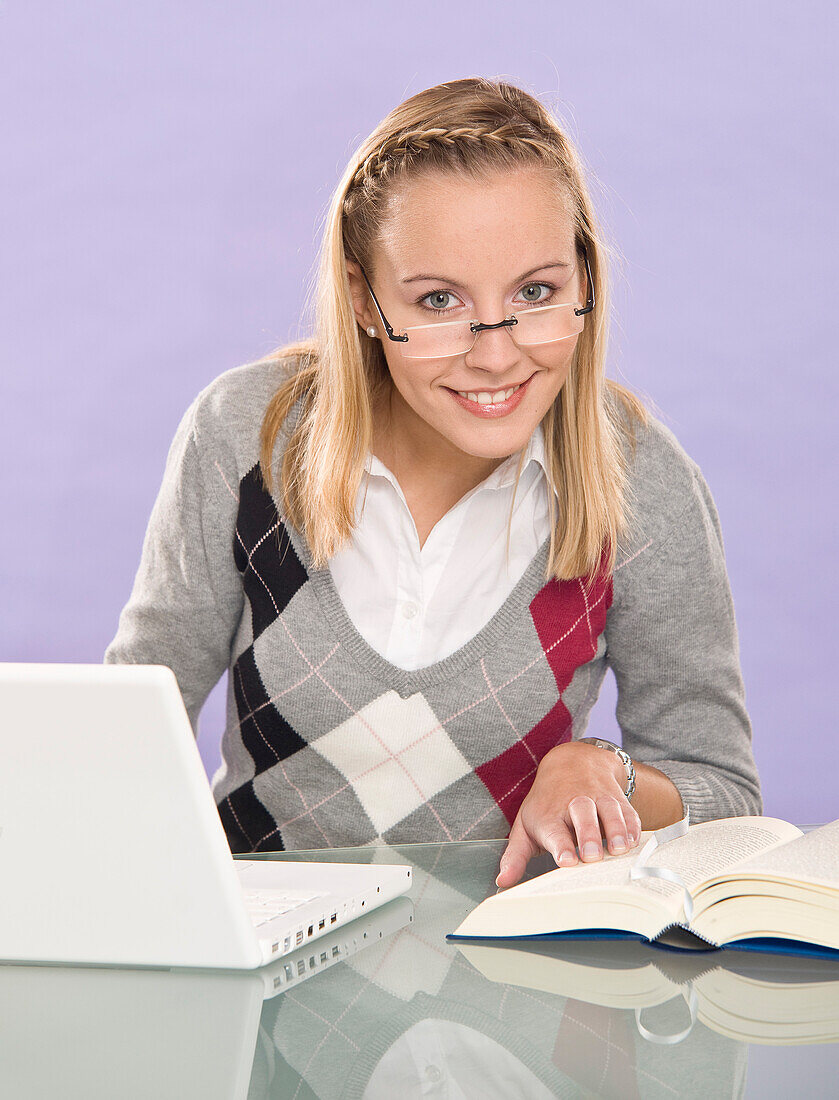 Young Woman Using Laptop Computer