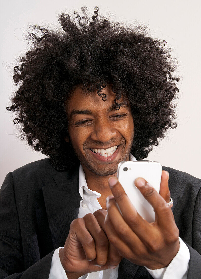 Young Businessman using Smartphone