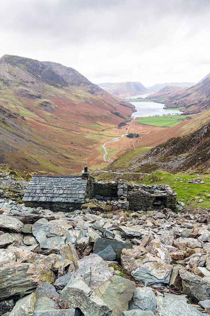 View towards Warnscales Bothy,a mountain shelter near Buttermere,with Haystacks,Buttermere and Crummock Water in the background,Lake District National Park,UNESCO World Heritage Site,Cumbria,England,United Kingdom,Europe