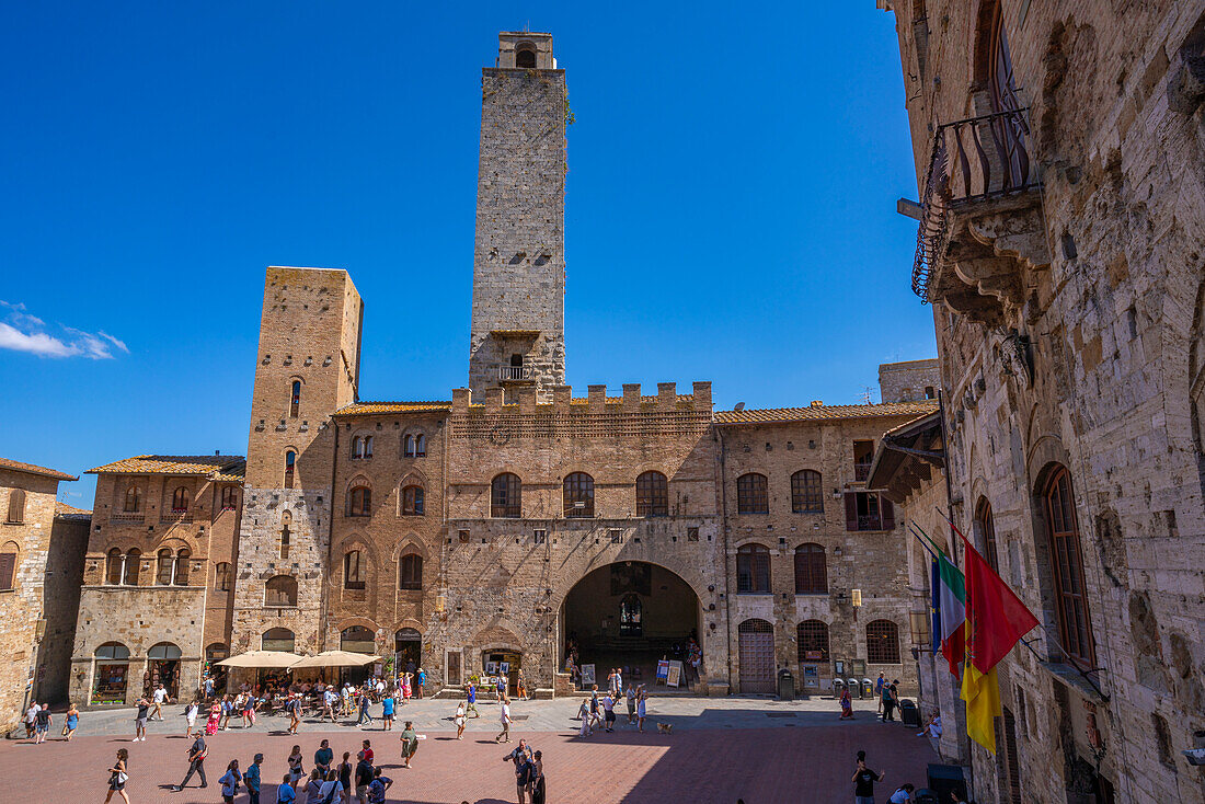 View of towers and Piazza del Duomo in San Gimignano,San Gimignano,UNESCO World Heritage Site,Province of Siena,Tuscany,Italy,Europe