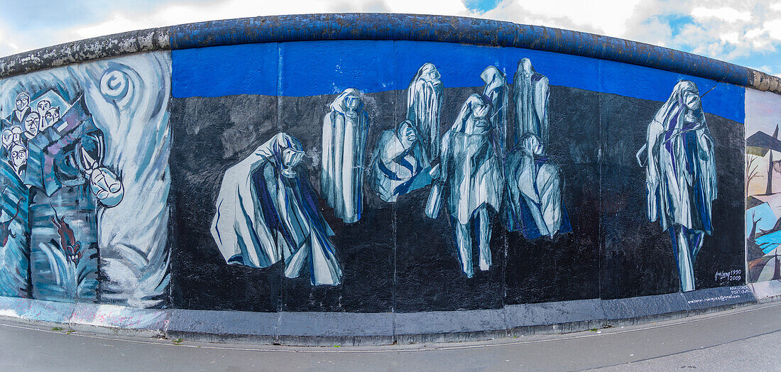 View of artwork at Berliner Mauer,Eastside section of the former Berlin Wall along the Spree River,Berlin,Germany,Europe