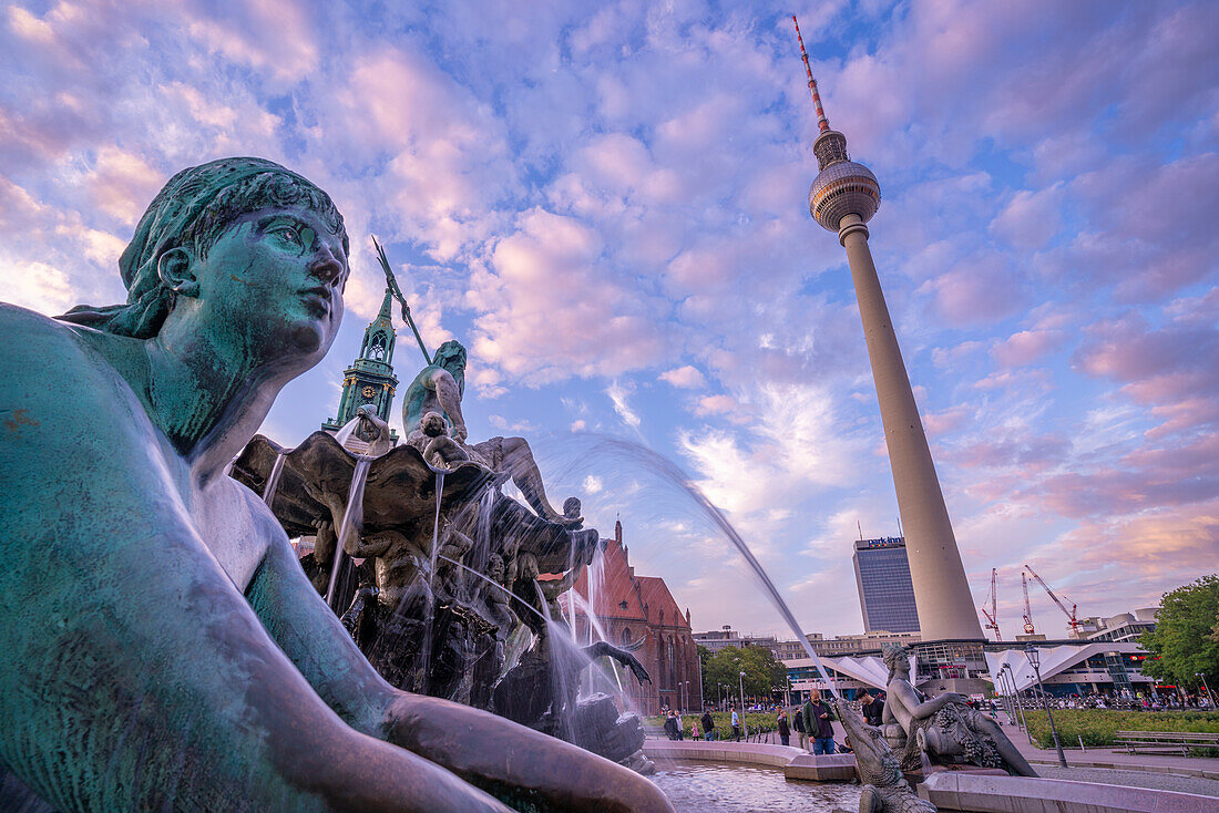 View of Berliner Fernsehturm and Neptunbrunnen fountain at dusk,Panoramastrasse,Berlin,Germany,Europe