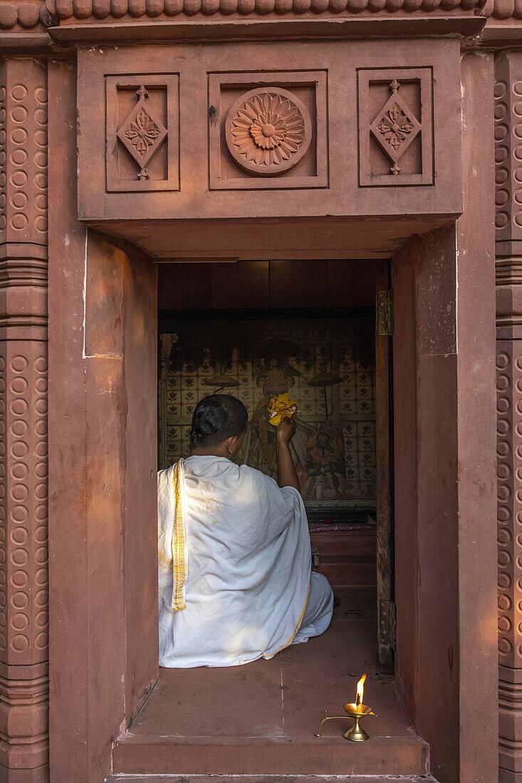 Priest performing ritual in a temple at Goverdan ecovillage,Maharashtra,India,Asia