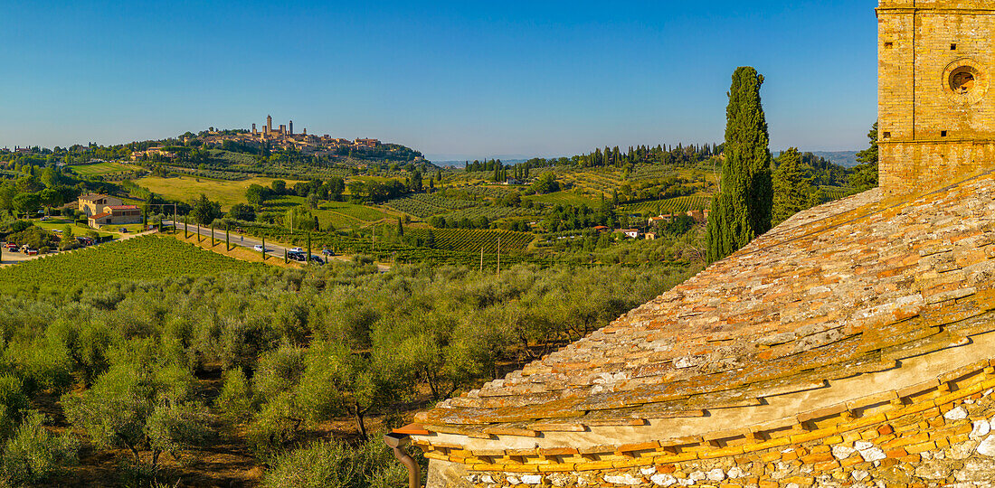 Elevated view of San Gimignano and town at sunset,San Gimignano,Tuscany,Italy,Europe