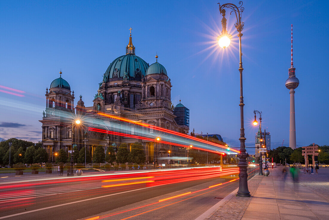 View of Berliner Dom (Berlin Cathedral) and trail lights at dusk,Berlin,Germany,Europe