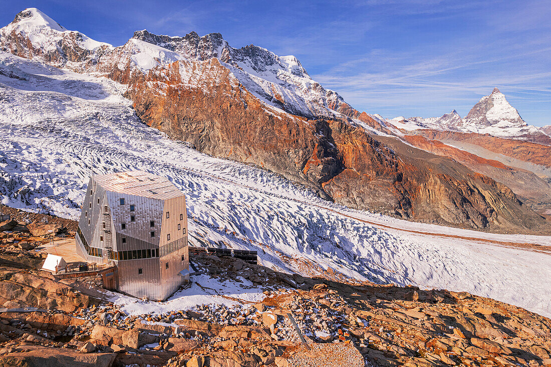 Monte Rosa hut (hutte) with the Matterhorn pyramid in the background,Gorner glacier,Zermatt,Valais canton,Switzerland,Europe
