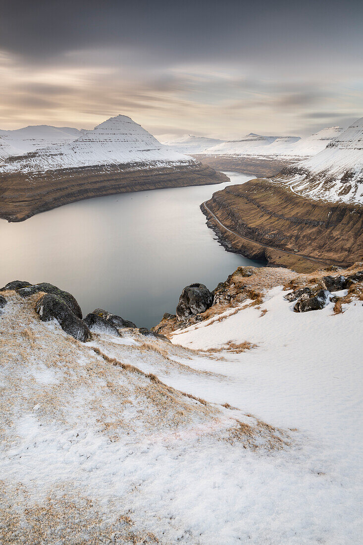 Snow-covered cliffs and mountains along Funningur fjord,Eysturoy Island,Faroe Islands,Denmark,Europe