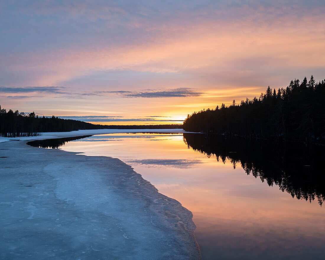 Channel leading to Lake Likapera at sunset,Finland,Europe