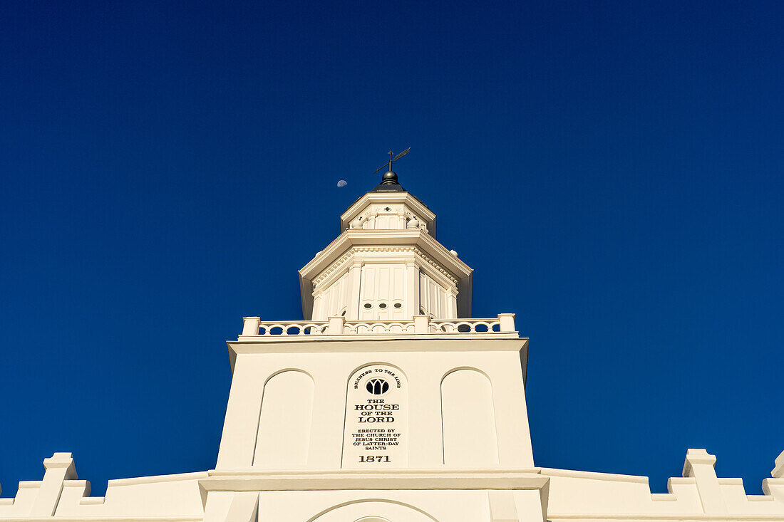 The moon & the steeple of the St. George Utah Temple of The Church of Jesus Christ of Latter-day Saints in St. George,Utah.