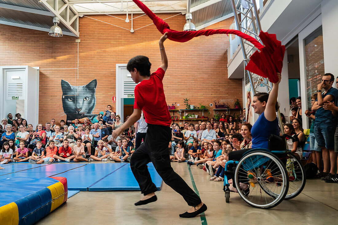 Circus show with kids at Centro Civico La Almozara during the Fiestas of el Pilar,Zaragoza,Aragon,Spain