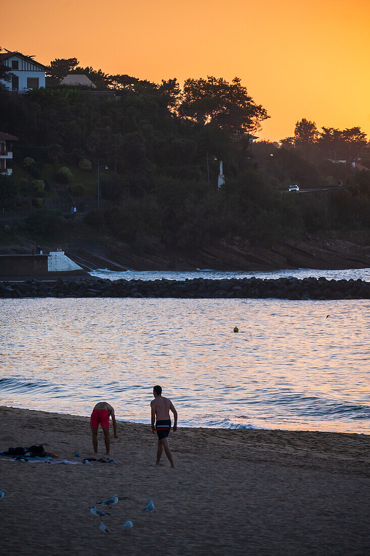 Grande Plage beach at sunset in Saint Jean de Luz,fishing town at the mouth of the Nivelle river,in southwest France’s Basque country