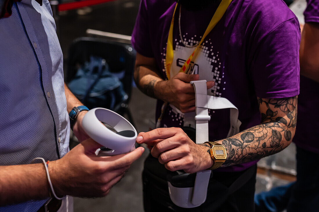 Young man playing with Meta Quest 2 all-in-one VR headset during ZGamer,a festival of video games,digital entertainment,board games and YouTubers during El Pilar Fiestas in Zaragoza,Aragon,Spain