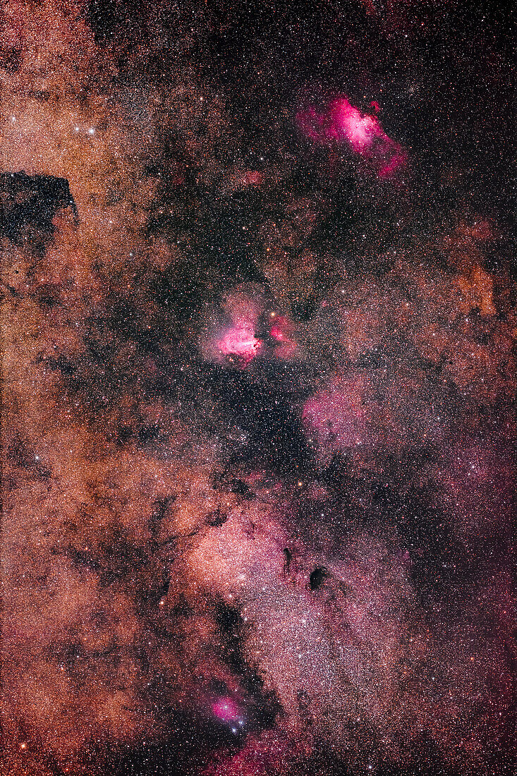 This is a framing of the rich starfield in northern Sagittarius to southern Serpens that contains the bright Messier 24 star cloud at bottom (aka the Small Sagittarius Starcloud),the emission nebula Messier 17 aka the Swan or Omega Nebula at centre,and Messier 16 or Eagle Nebula at top.