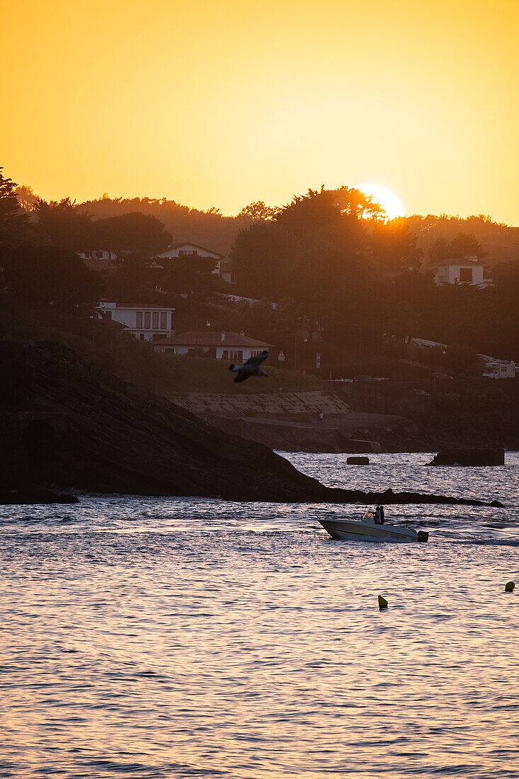 Grande Plage beach at sunset in Saint Jean de Luz,fishing town at the mouth of the Nivelle river,in southwest France’s Basque country