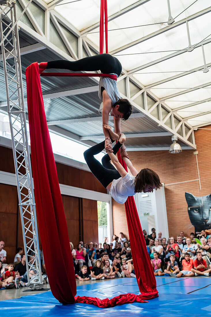 Circus show with kids at Centro Civico La Almozara during the Fiestas of el Pilar,Zaragoza,Aragon,Spain