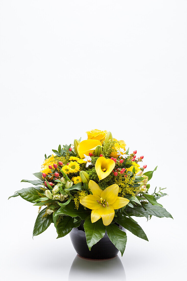 Yellow bouquet of lilies, calla lilies