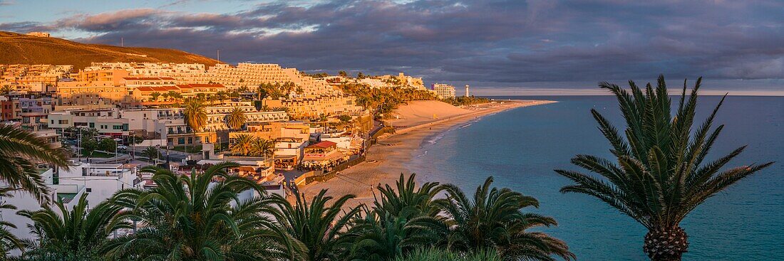 Spain, Canary Islands, Fuerteventura Island, Morro Jable, of Playa de la Cebada beach, sunset