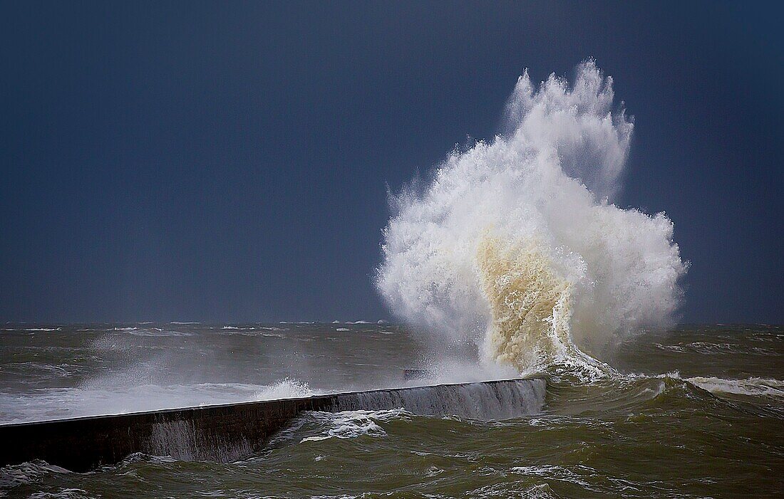 France, Morbihan, Ploemeur, Port de Lomener, wave on the dike during a storm