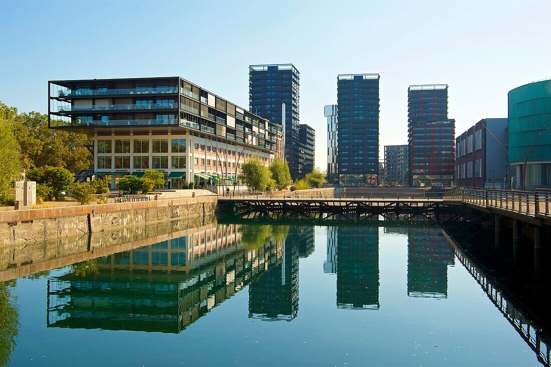 France, Bas Rhin, Strasbourg, development of port du Rhin (Rhine's harbour) and conversion of breakwater of Bassin d'Austerlitz, rehabilitation of the Seegmuller warehouse in offices, shops and accommodation by the agency Heintz-Kehr Architects, the 3 Black Swans tower of architect Anne Demians and UGC Cine Cite cinema complex