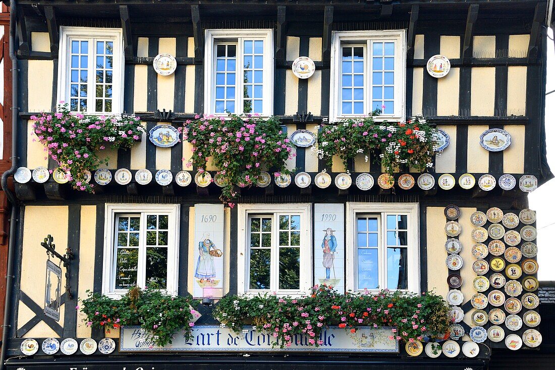 France, Finistere, Quimper, place St. Corentin square, medieval half-timbered house, Earthenware of Quimper HB Henriot store