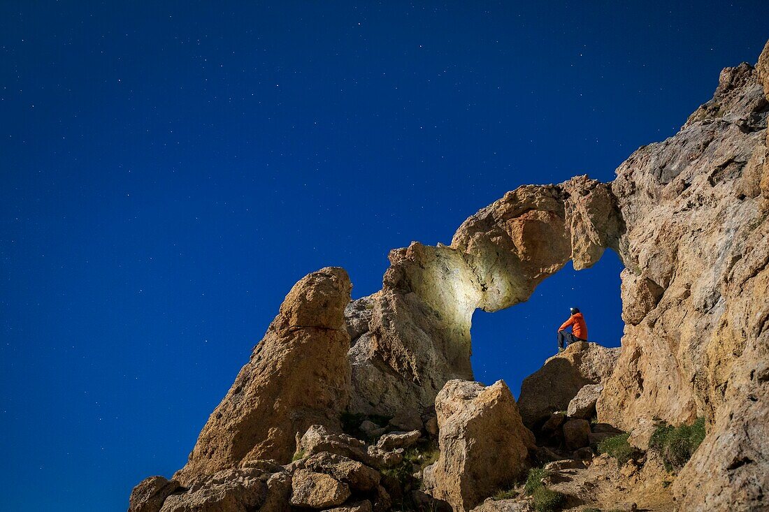 France, Alpes-Maritimes, Mercantour National Park, the Tortisse Arch (2550m) illuminated by the moon