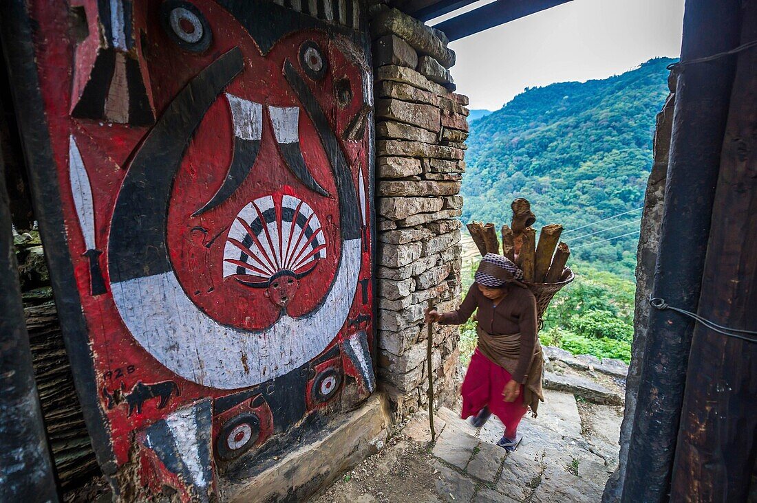 India, Nagaland, Khonoma, Angami Nagas, gate of the fortified village, painted with the colors and symbols of the traditional beliefs