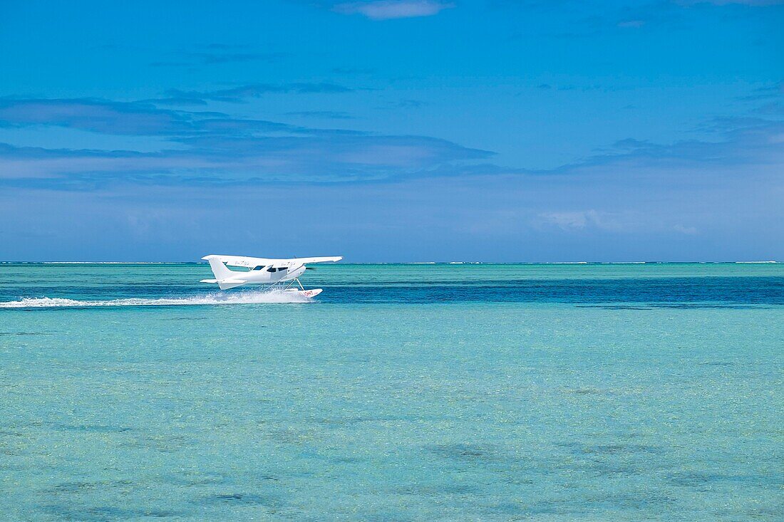 Mauritius, Riviere Noire district, Prairie beach, flying in a seaplane