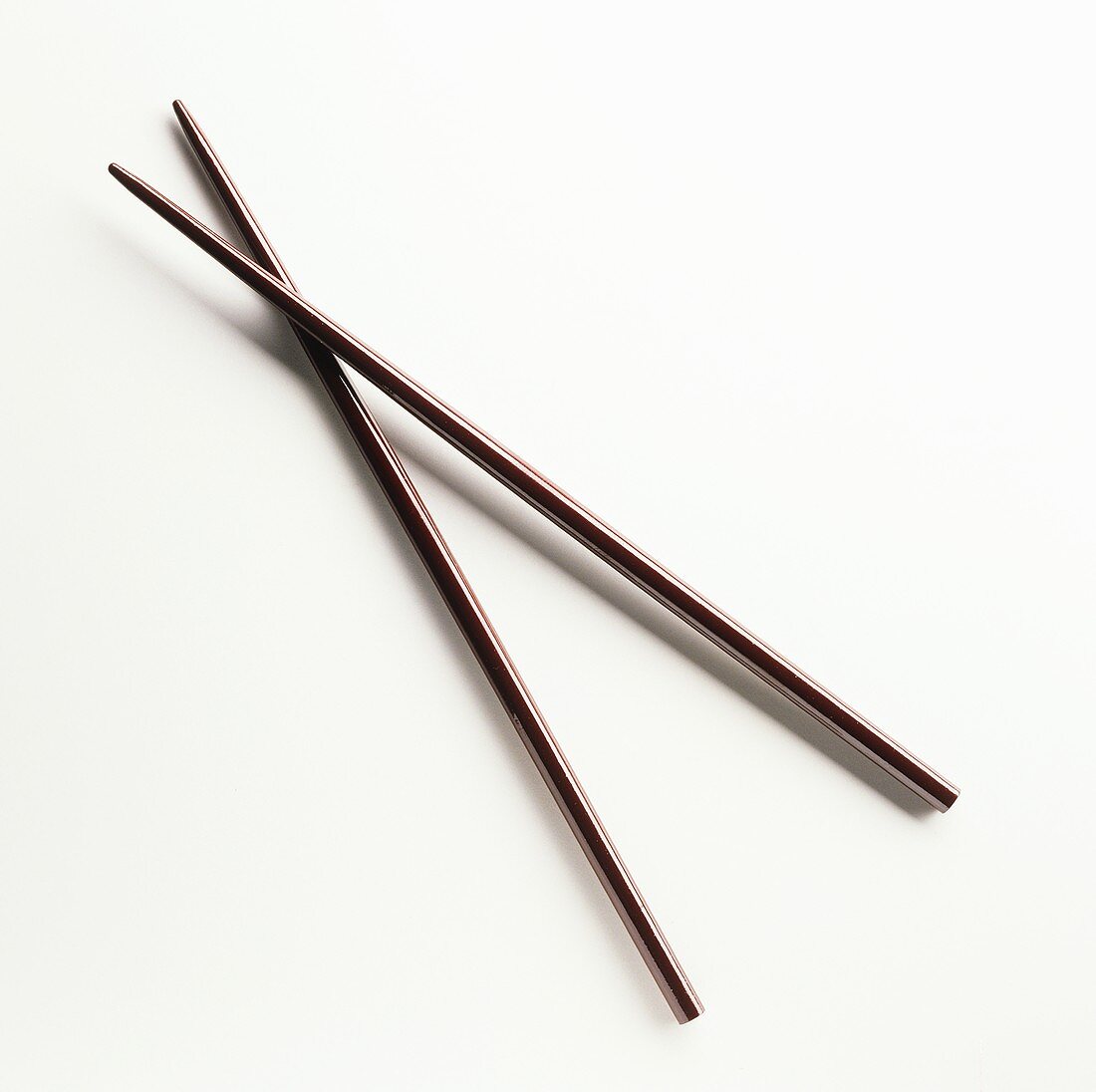 Two brown chopsticks
