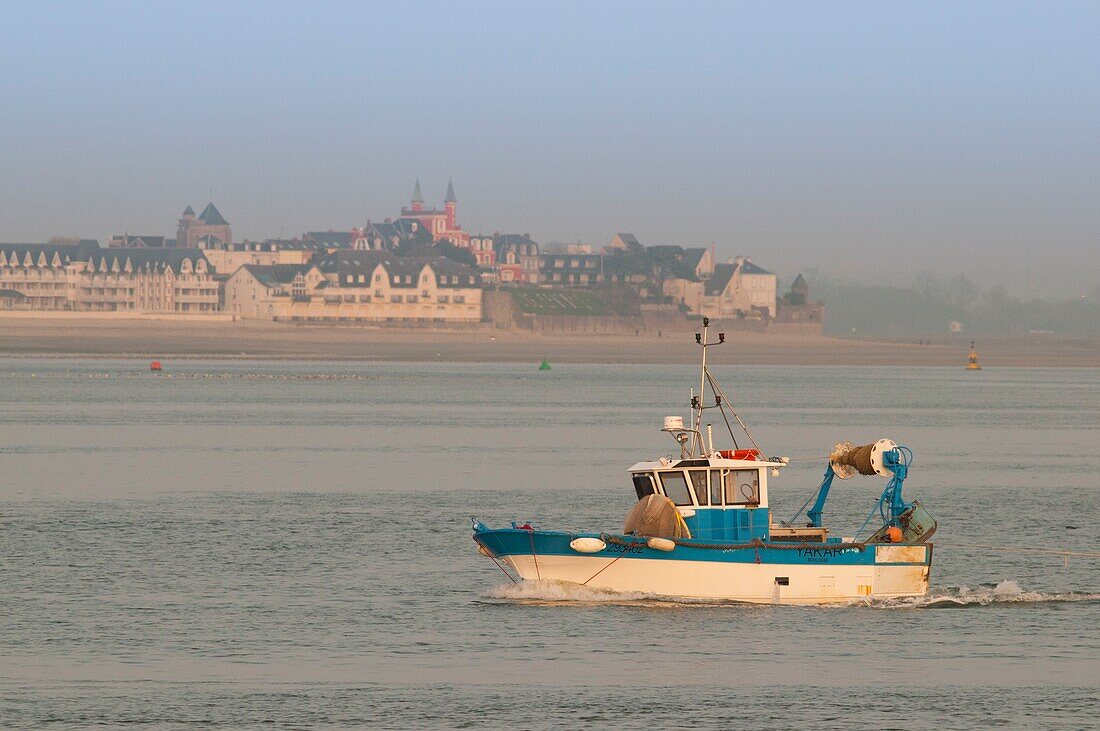 France, Somme, Baie de Somme, Le Crotoy, Exit of fishermen from the port of Hourdel in Baie de Somme, view of Le Crotoy, across the bay in the background