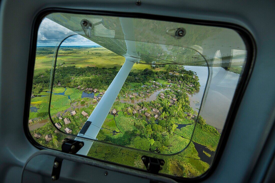 Papua New Guinea, East Sepik Province, Sepik River Region, Central Sepik, Timbunke Village from Samaritan Aviation Missionary Seaplane (Aerial view)