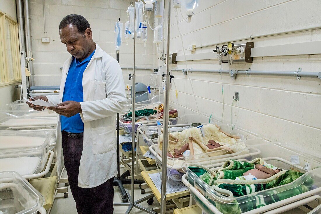 Papua New Guinea, Western Highlands Province, Mount Hagen, Mount Hagen Hospital, underweight baby is kept warm in an isolation ward