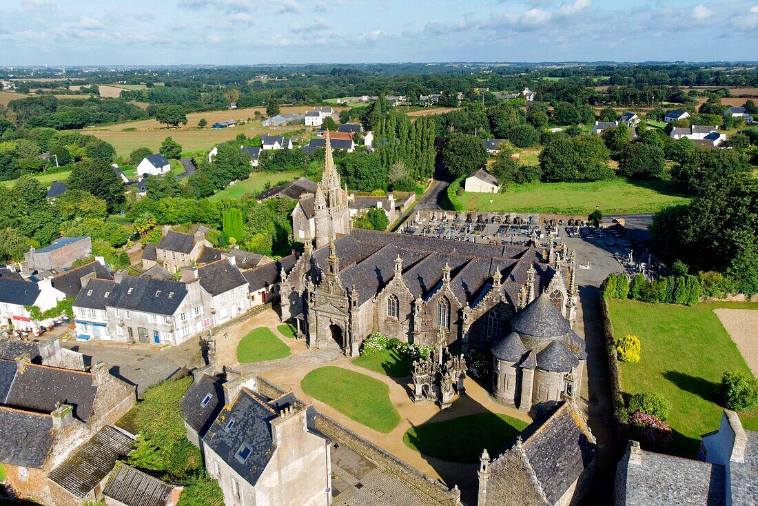 France, Finistere, Guimiliau, parish enclosure, the church, the calvary and the ossuary (aerial view)