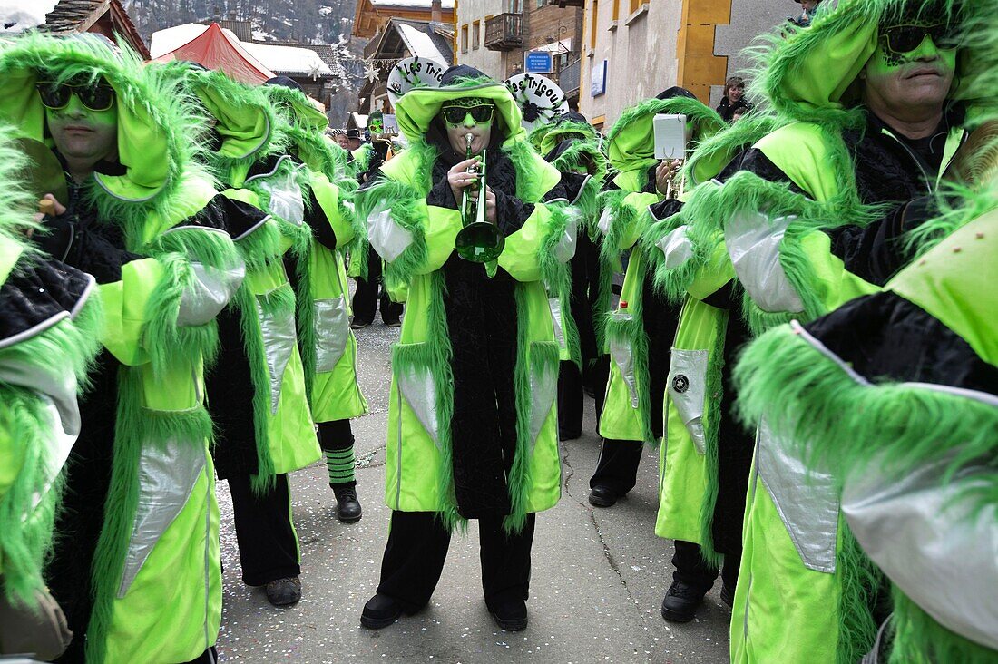 Switzerland, Valais, Evolene valley, Evolene, Carnaval with the Empailles and the Peluches who come from Pagan rites and go around the villages to frighten the bad spirits of winter, Guggenmusic group