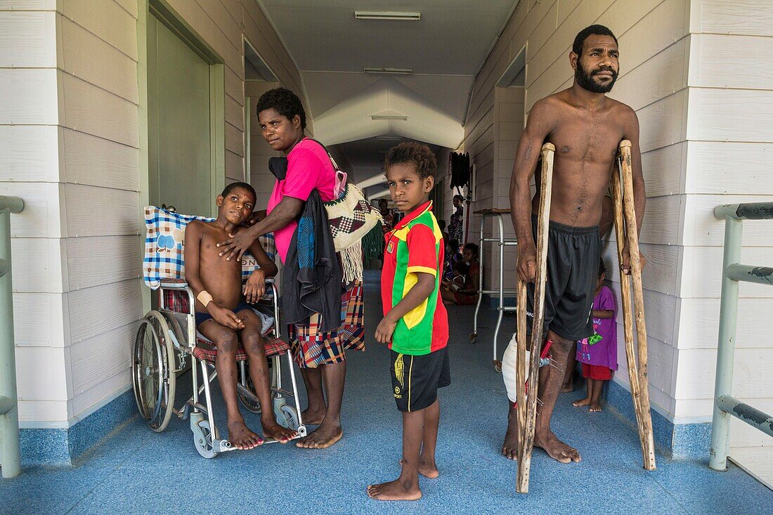 Papua New Guinea, East Sepik Province, Sepik River Region, Wewak Town, Boram Hospital, suspected of having polio, young Nagui Hombi from Numbogu village is paralyzed from all four limbs and unable to move without the help of a family member