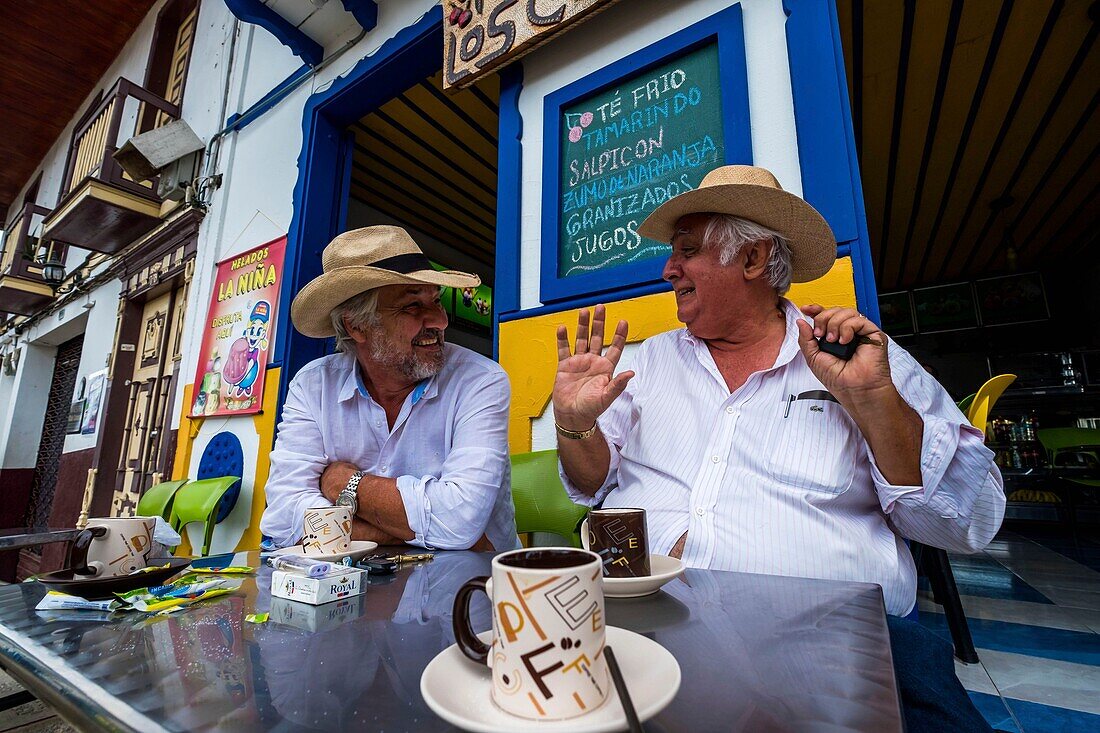 Colombia, Valley of coffee, Marseilla, sharing a coffee on terrace with Don Luis, rich local cafetero