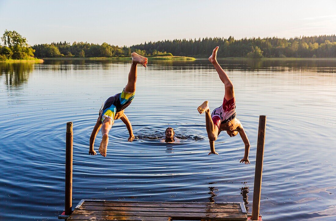 Sweden, County of Vastra Gotaland, Hokerum, Ulricehamn hamlet, Rochat family report, sunday family relaxation in one of the lakes around the house