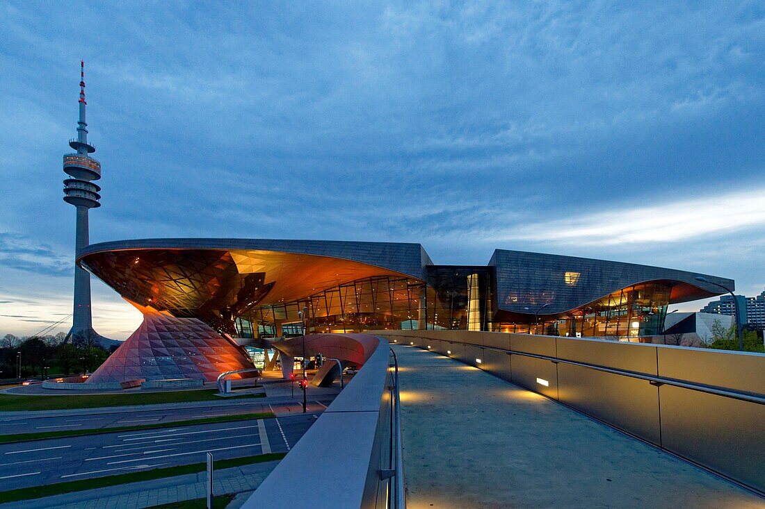 Germany, Bavaria, Munich, BMW Welt, showroom of the brand native from Munich opened in 2007 and realized by the architect firm Coop Himmelb(l)au and the Olympic tower or Olympiaturm