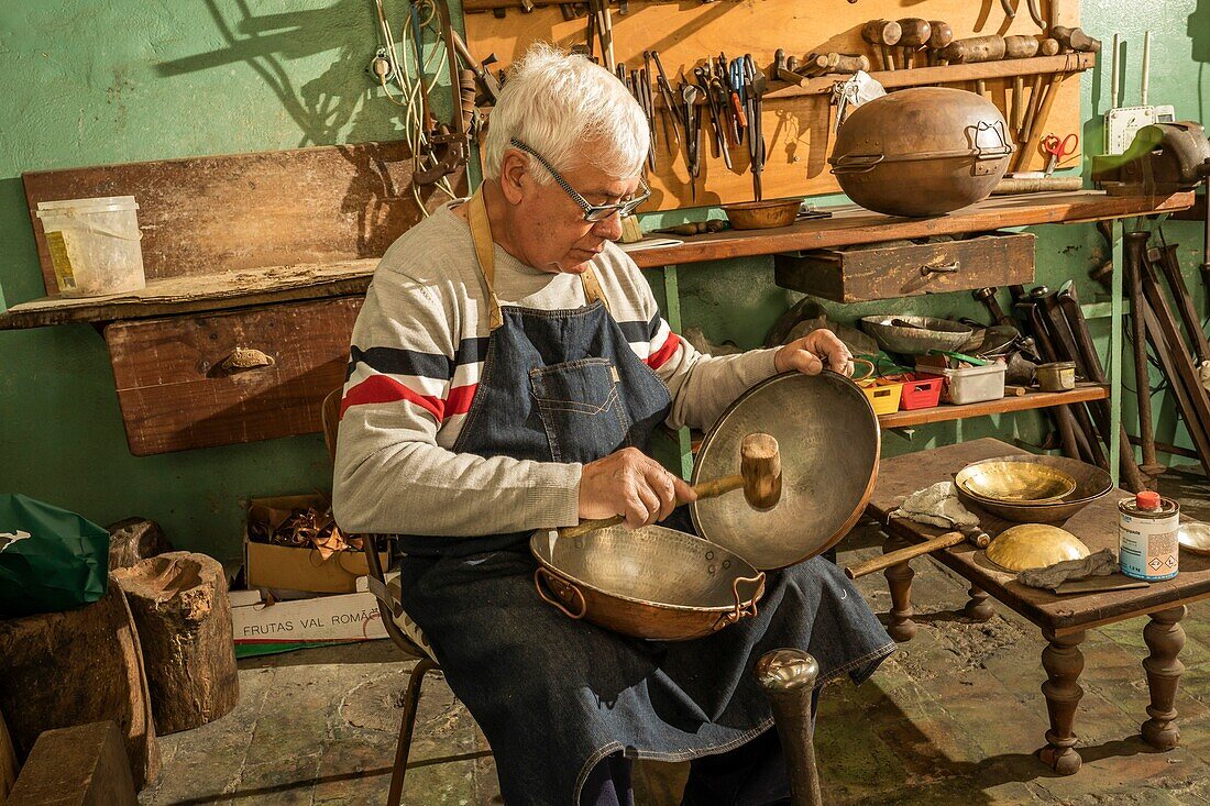 Metalsmith craftsman, Analide Carmo, copper shop, Loule, Algarve, Portugal, Europe