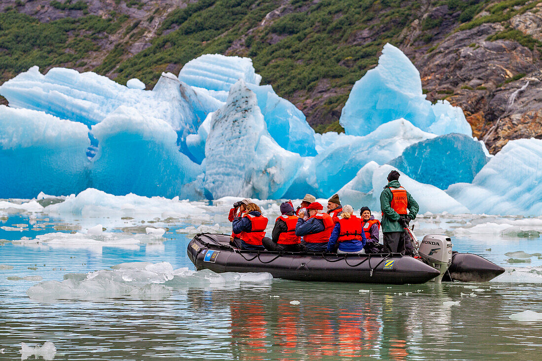 Guests from the Lindblad Expeditions ship National Geographic Sea Bird during Zodiac operations in Tracy Arm, Southeast Alaska, United States of America, North America