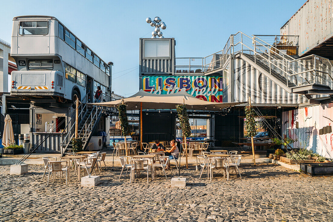 Village Underground Lisboa, an international platform for creativity, art, and culture, built with two buses and 14 shipping containers converted into creative spaces, Lisbon, Portugal, Europe