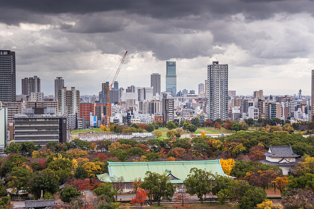 View from Osaka Castle over Nishinomaru Garden and skyline in the background, Osaka, Honshu, Japan, Asia