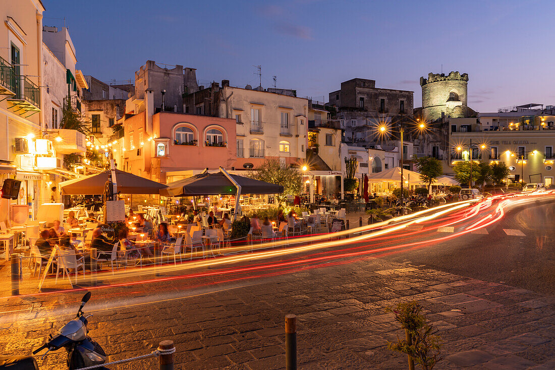 View of cafes and bars on Via Marina at dusk, Forio, Island of Ischia, Campania, Italy, Europe