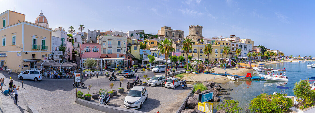 View of cafes and bars at the marina and Torrione Castle Museum, Forio, Island of Ischia, Campania, Italy, Europe