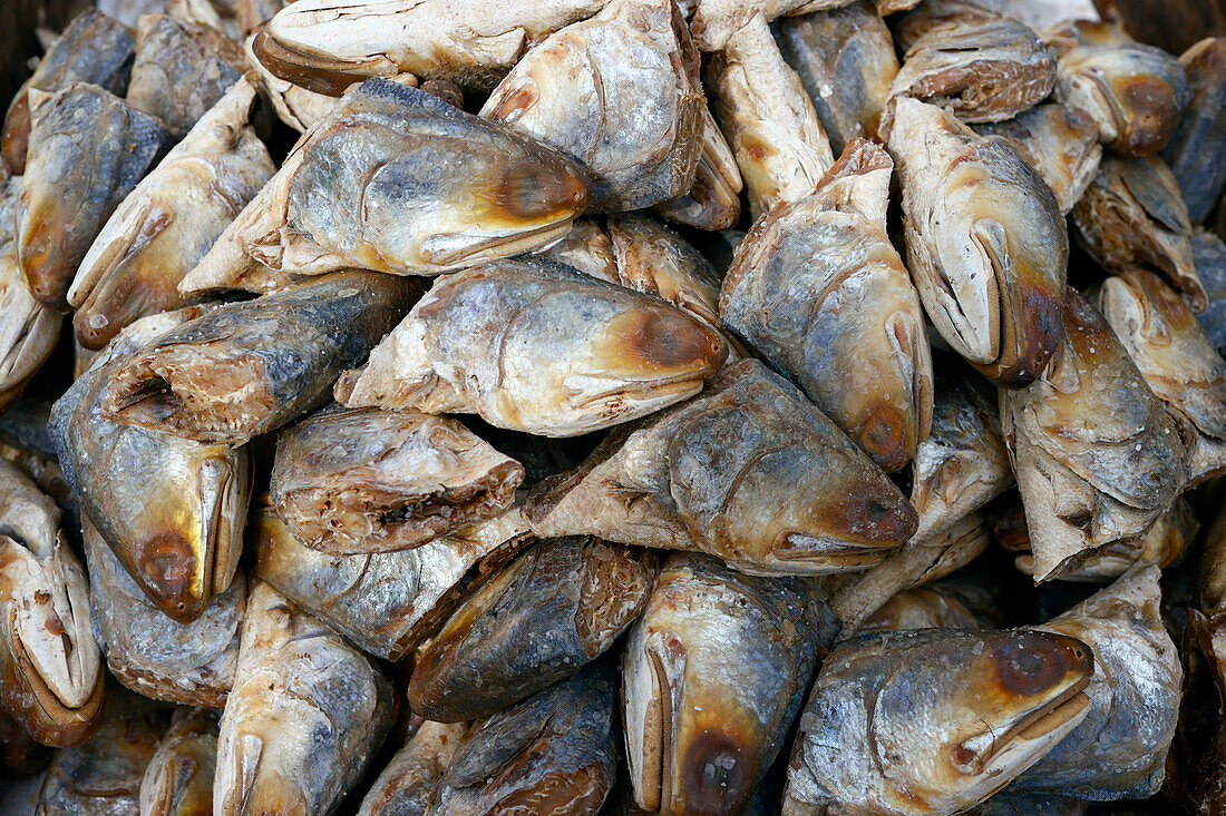 Heads of dry fish for sale at local market, An Giang Province, Mekong Delta, Vietnam, Indochina, Southeast Asia, Asia, Asia