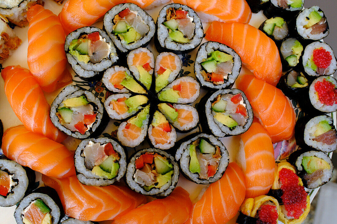 Different Japanese rolls and sushi on a plate, Japanese food, France, Europe