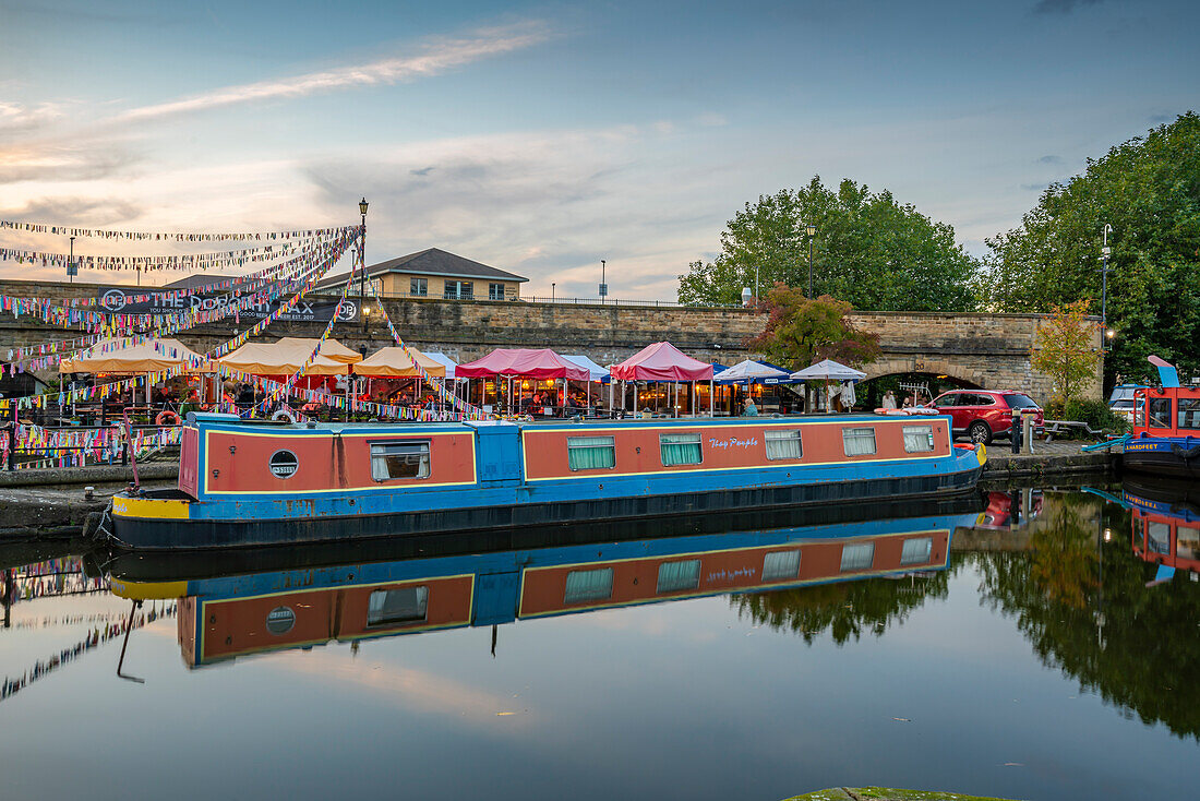 View of canal boats at Victoria Quays at sunset, Sheffield, South Yorkshire, England, United Kingdom, Europe