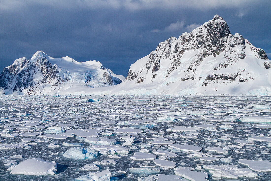 Brash ice chokes the Lemaire Channel on the west side of the Antarctic peninsula in Antarctica, Polar Regions