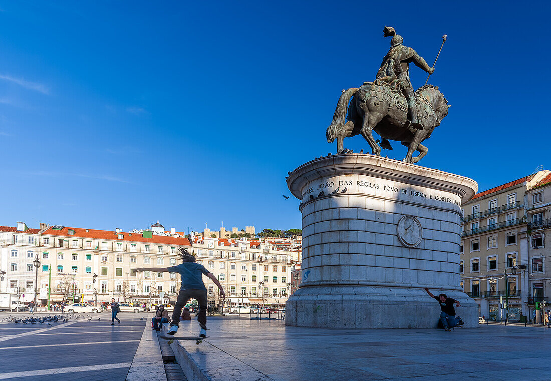 Lisbon, Portugal, March 1 2007, Young skaters practice their tricks in Figueira Square, enjoying the vibrant atmosphere of Lisbon's urban landscape.